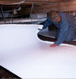 La Porte insulation being installed in a crawl space.