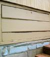an old-fashioned crawl space door in Osceola about to be replaced