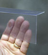 Closeup of a clear plastic covering on a Granger crawl space block wall