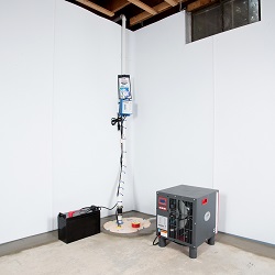 Sump pump system, dehumidifier, and basement wall panels installed during a sump pump installation in Wabash