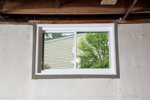 Repaired waterproofed basement window leak in Goshen